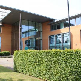 Photograph of outside of Hybrid Software Helix office building